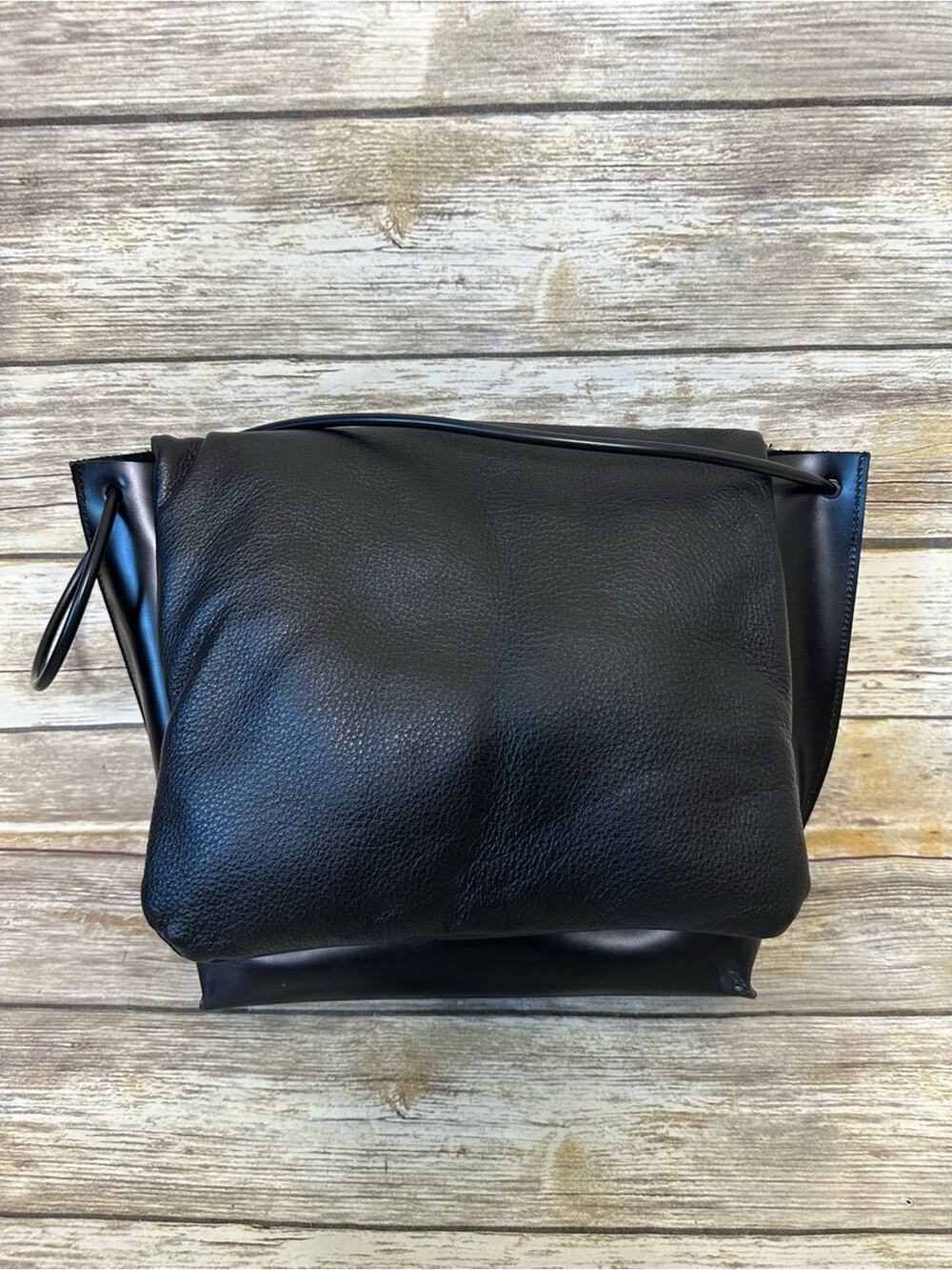Kozha Numbers one of a kind black puffed flap runway design purse